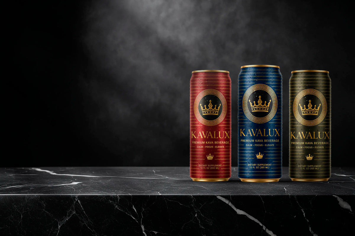 Red, blue and green KAVALUX cans on a black marble counter
